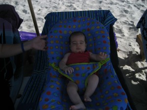 Katie chillin on the beach saying hi to everyone