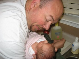 Daddy helping wash Leia's hair